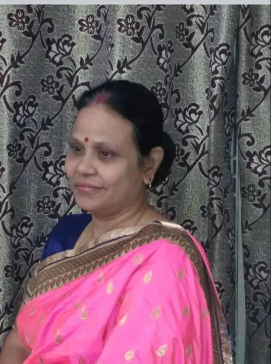 Portrait of a woman wearing a pink sari