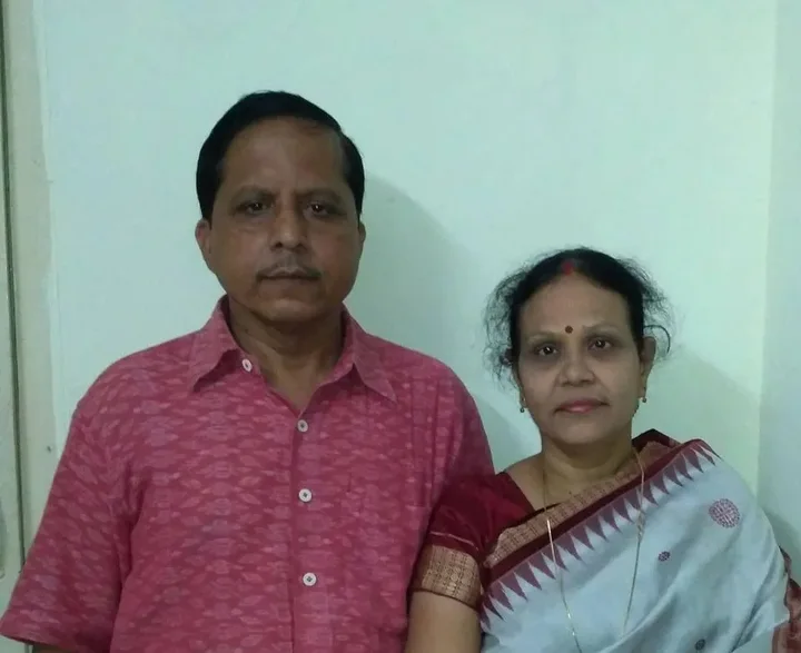 Pradeep Biswal and a woman posing together